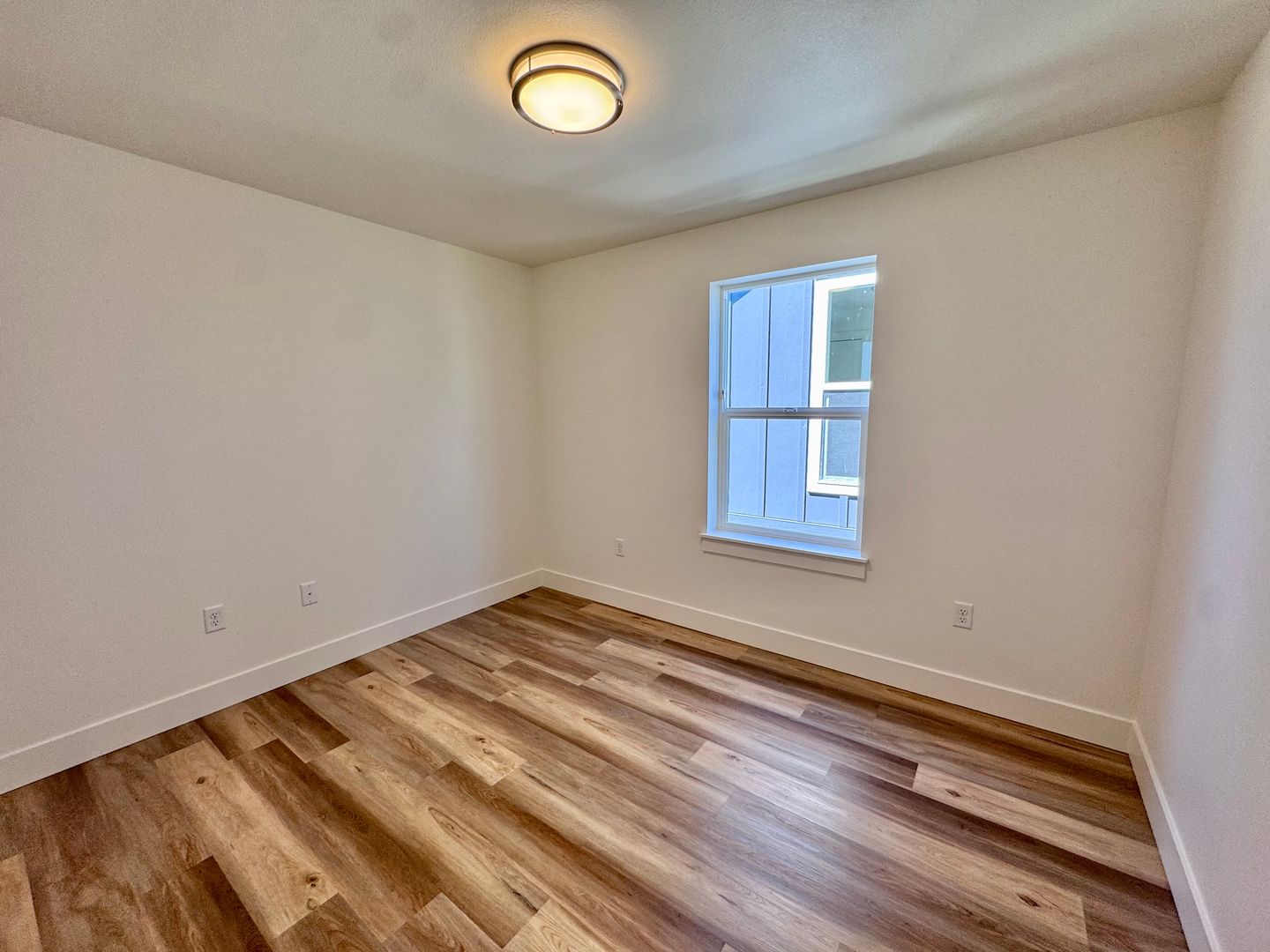 Bedroom with large window and natural light
