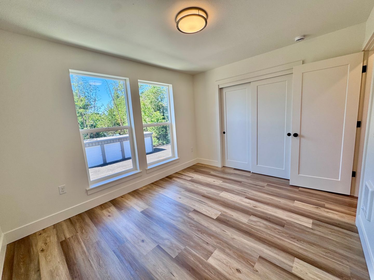 Second bedroom with sliding closet doors