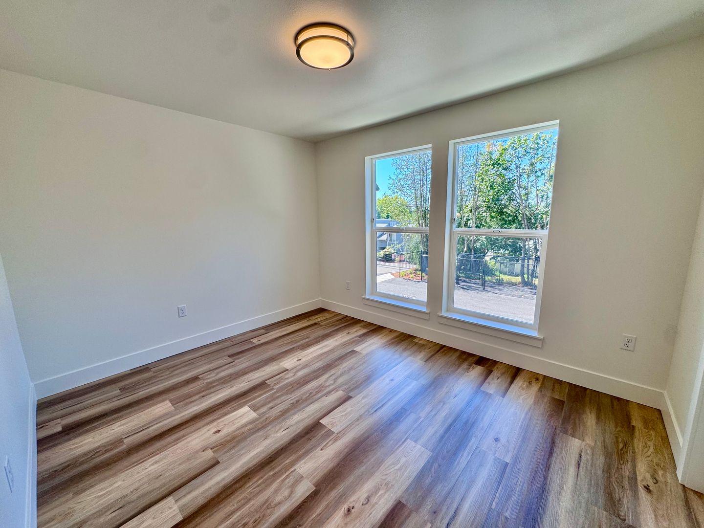 Bedroom with large windows and natural light